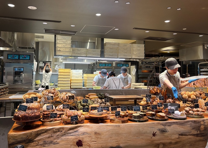 Comme'N Tokyo bread display with over 100 varieties