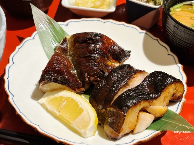 Black cod Kyoto miso and blackthroat seaperch yuzu charcoal-grilled close-up
