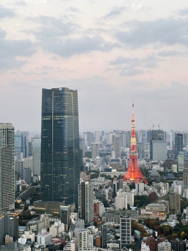 Panoramic Tokyo night view of Tokyo Tower and Tokyo Skytree from Roppongi Hills Tokyo City View Observatory