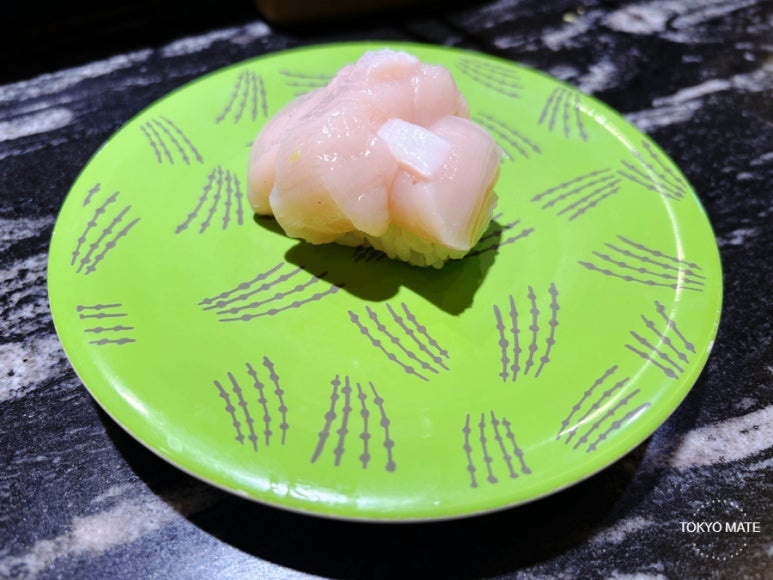 Signature double-layered scallop sushi