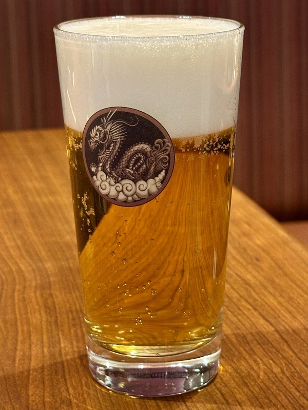 Suntory draft beer in a Ginza Tenryu glass with the dragon emblem