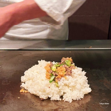 Beef asparagus garlic rice cooking process on the teppan