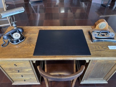 Close-up of historical items on the director's desk