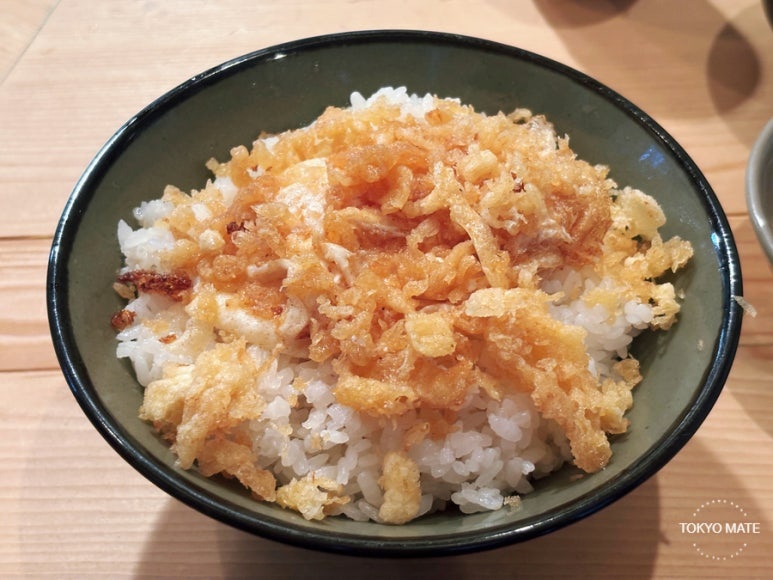 Tensuke tamago lunch rice topped with soft-boiled egg tempura and tenkasu