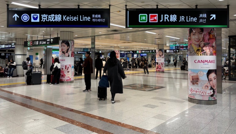 Red JR ticket gate signage at Narita Airport