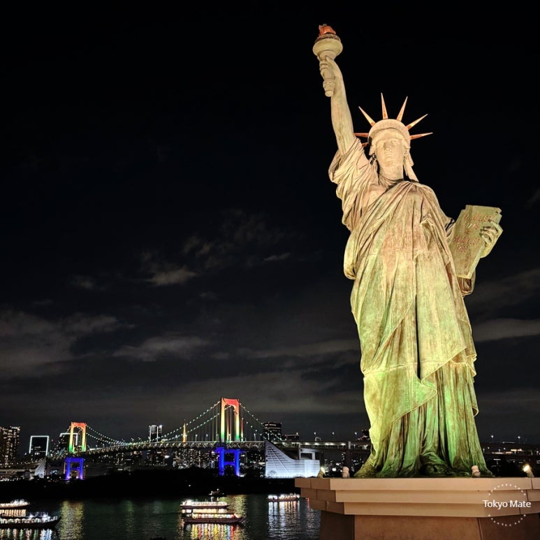 Odaiba Rainbow Bridge night view with the Statue of Liberty
