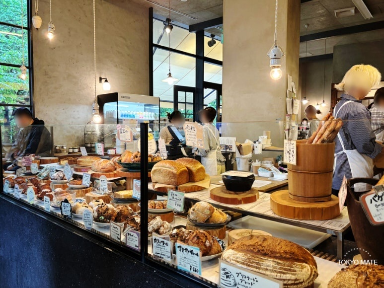 Bricolage Bread and Co. bakery interior with bread display counter
