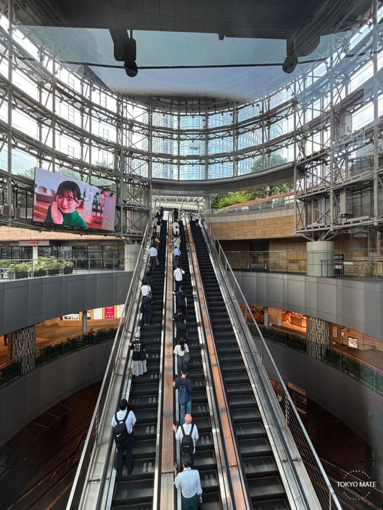 Hibiya Line Roppongi Station Exit 1C escalator to Roppongi Hills 66 Plaza