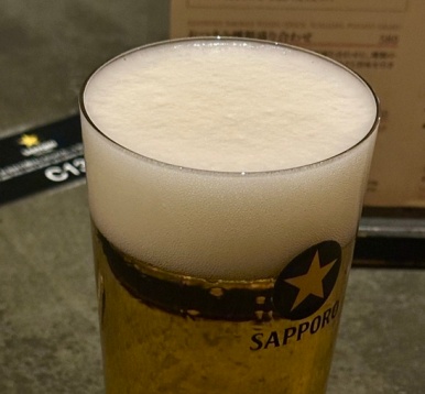 Close-up of the head on a First draft beer at Sapporo The Bar