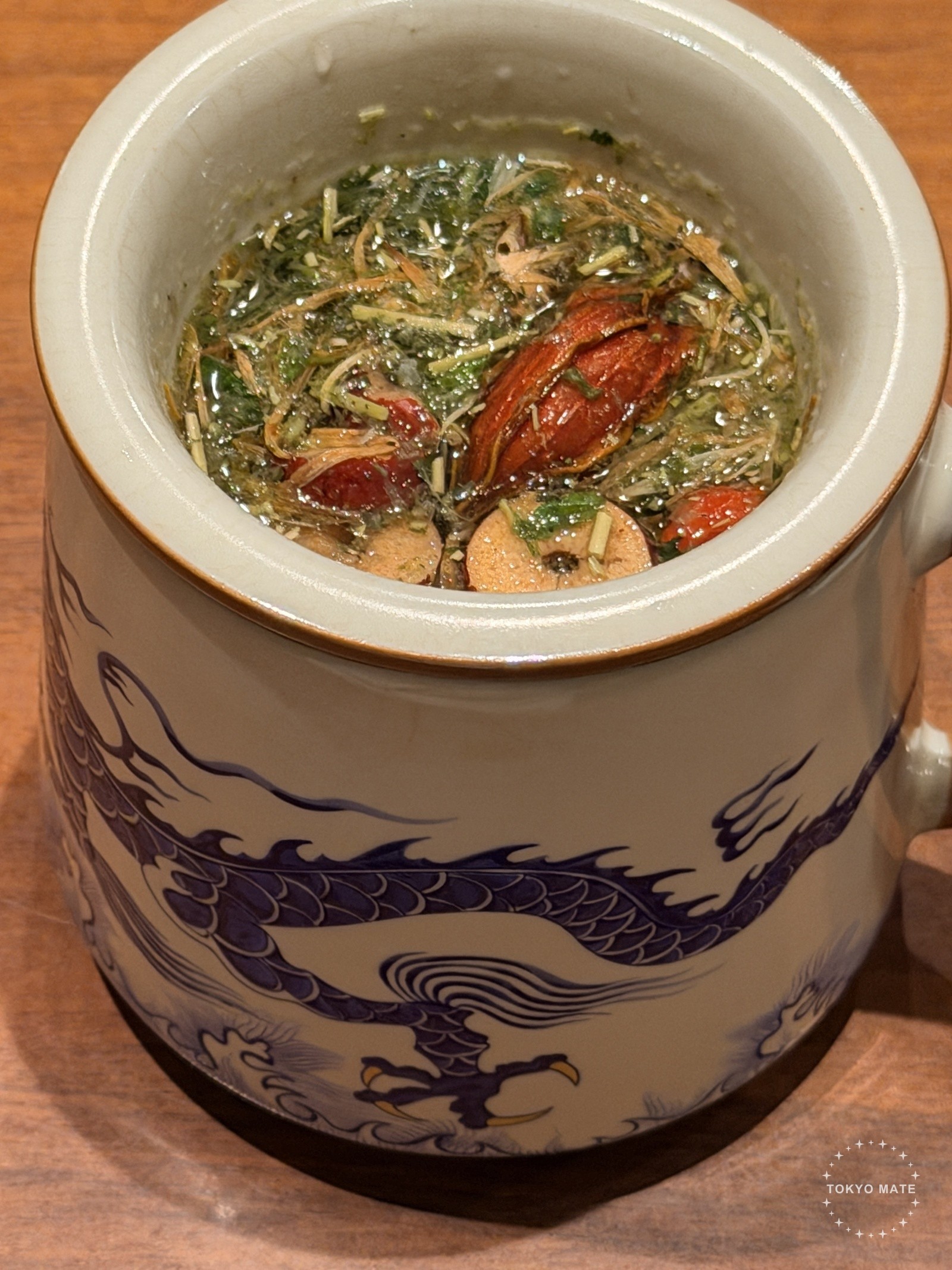 Jujubes, goji berries and chrysanthemum petals inside the mug