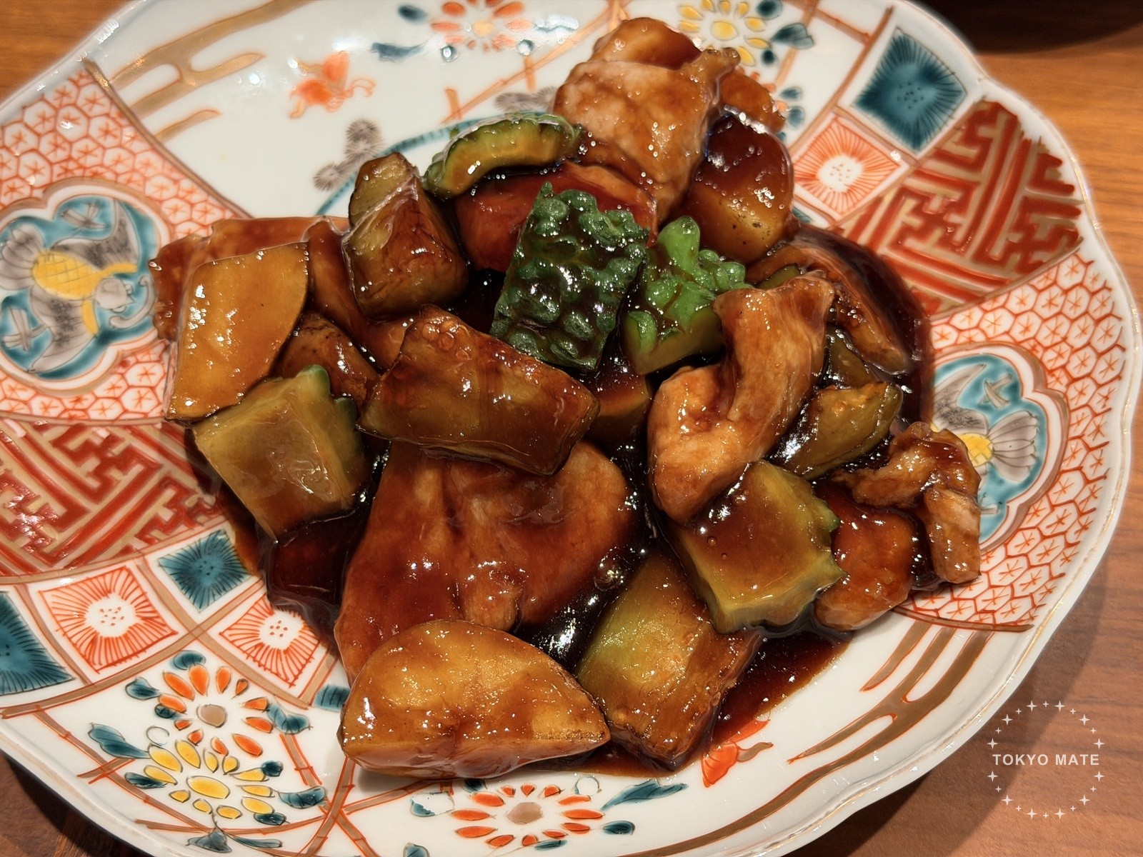 Black pork loin with bitter melon and eggplant in black vinegar sauce
