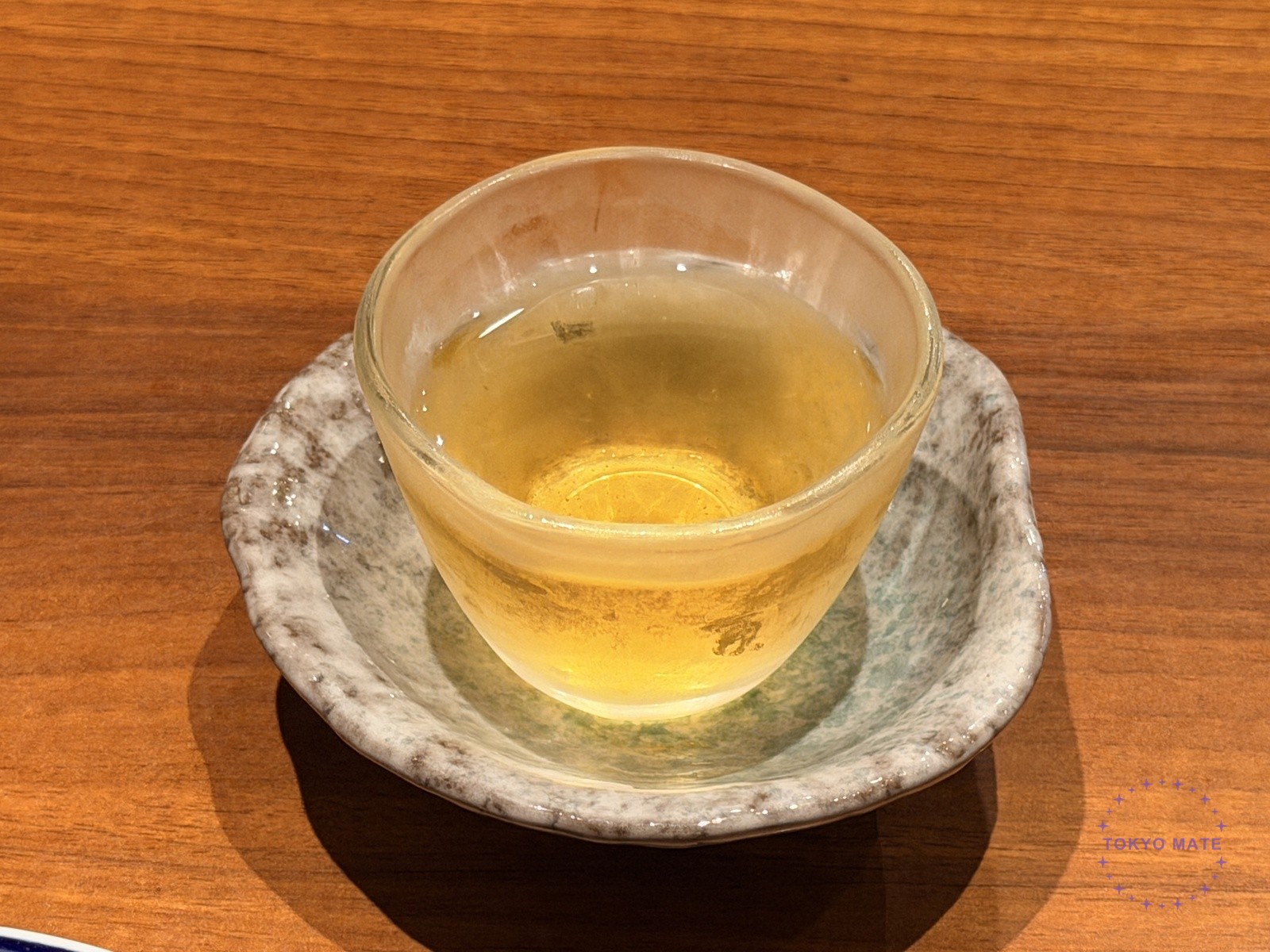 Natural maca liquor in a small glass