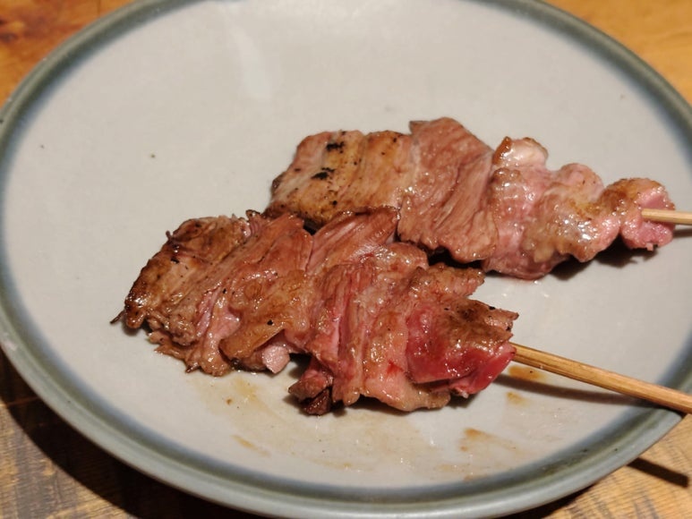 Shinjuku Omoide Yokocho Sasamoto - locals queue for yakitori skewers, rich soy sauce and fire aroma are excellent