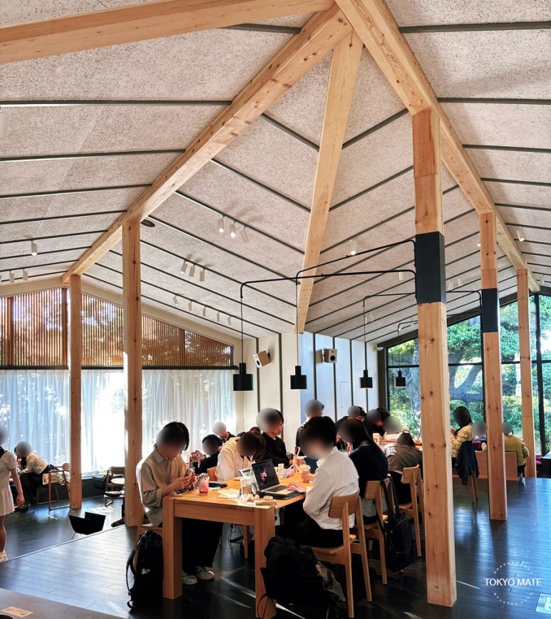 Central community table on the 2nd floor designed by HAGISO