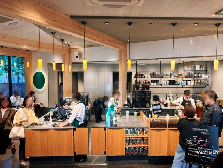 First-floor menu counter at Starbucks Yanaka Gotenzaka with seasonal drinks