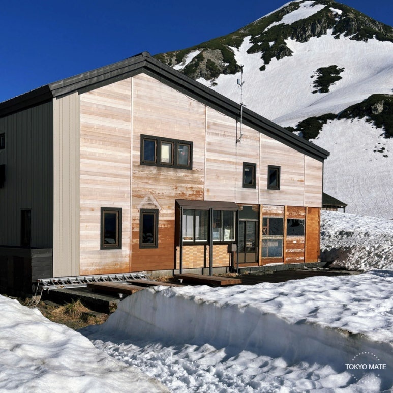 Exterior of Murodo Sanso with the Tateyama snow mountains