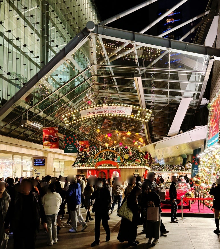 2025 Roppongi Hills Christmas Market panorama with signature German-style wooden booths
