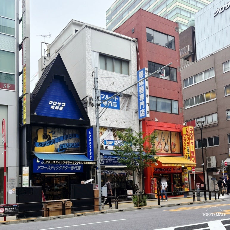 Panorama of Ochanomizu Instrument Street lined with guitar and instrument shops