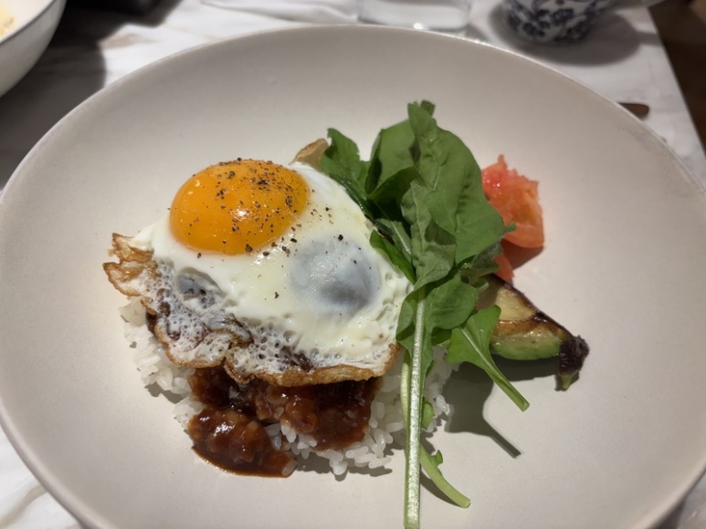 The Front Room Loco Moco with burger patty and fried egg over rice