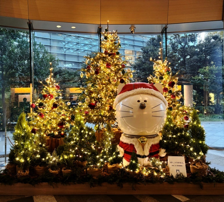 Toranomon Hills mascot 'Toranomon' cute character resembling Doraemon