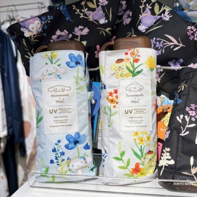Cinnamoroll and Pompompurin Wpc. folding parasols with floral prints
